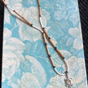 Elegant Beaded Necklace with Turtle Pendant
